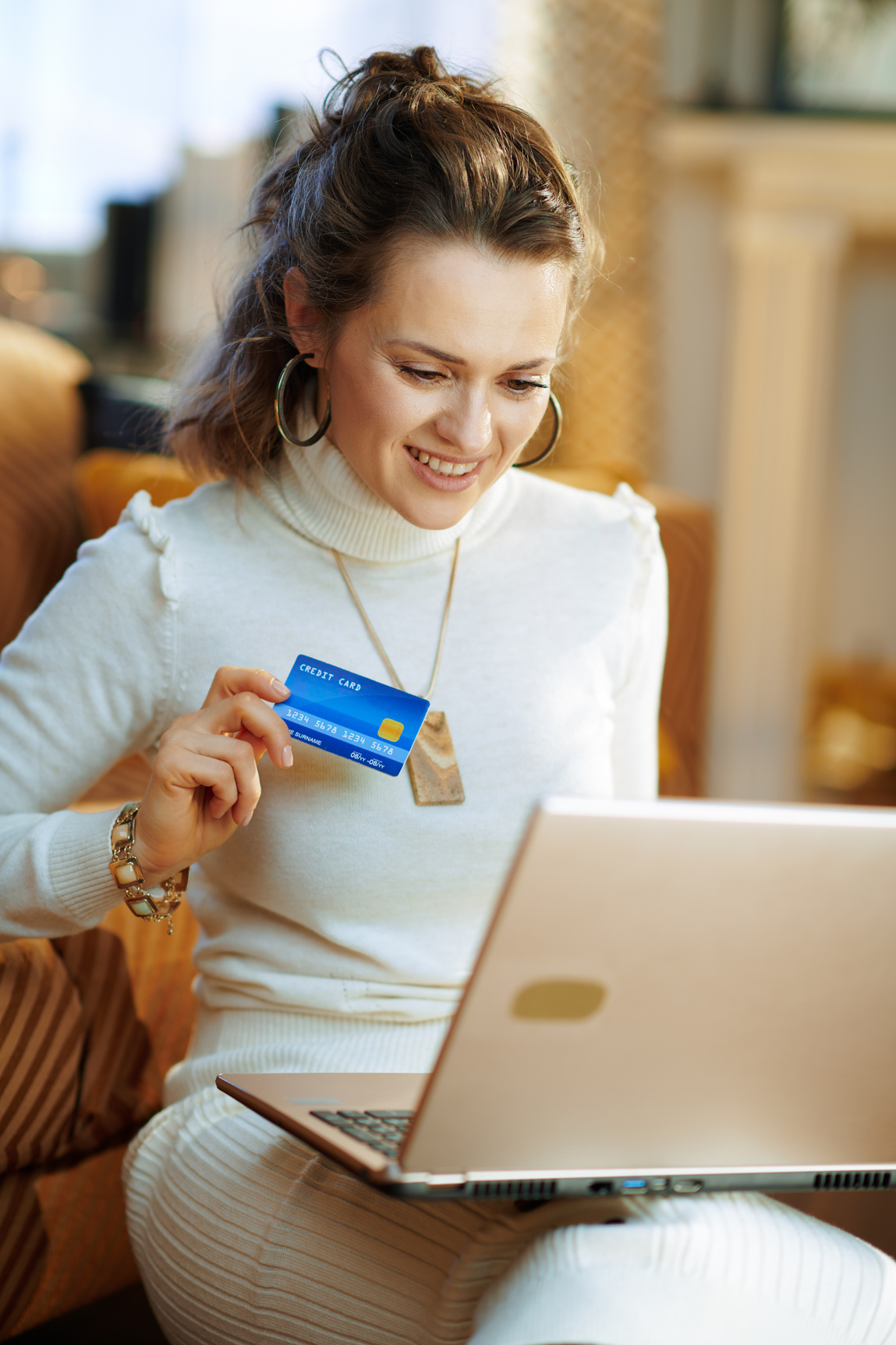 smiling woman making online shopping on e-commerce website